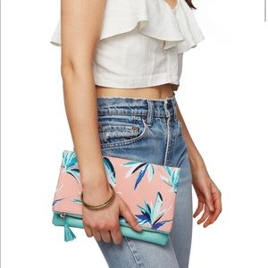 Rachel Pally reversible clutch